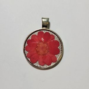 Red flower pendant.